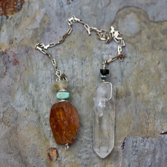 Rutilated Quartz, Turquoise, Sunstone, Onyx, Single Termination Clear Quartz Dolphin Crystal, and Sterling Silver Double-sided Pendulum