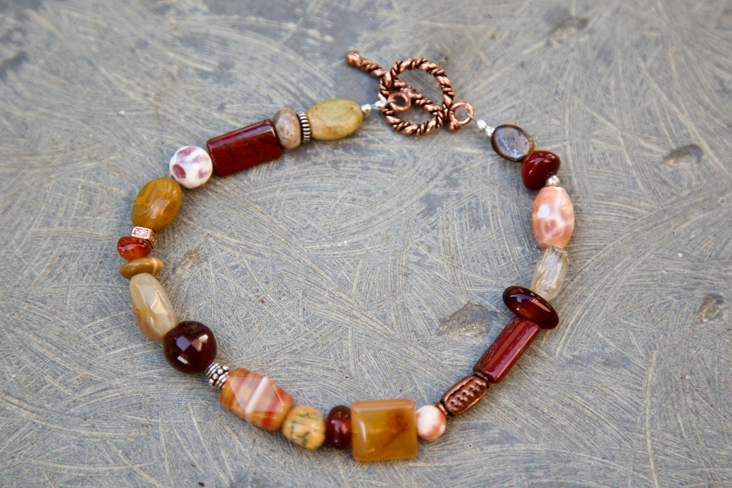 Orange Stones, Sterling Silver, and Copper Bracelet to fit an 8 inch wrist